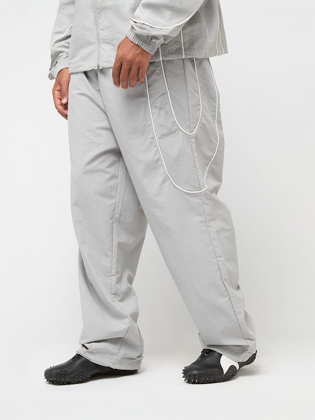 PUMA, Pumatech-X Relaxed Track Pant Woven, grey, Image 1 of 8