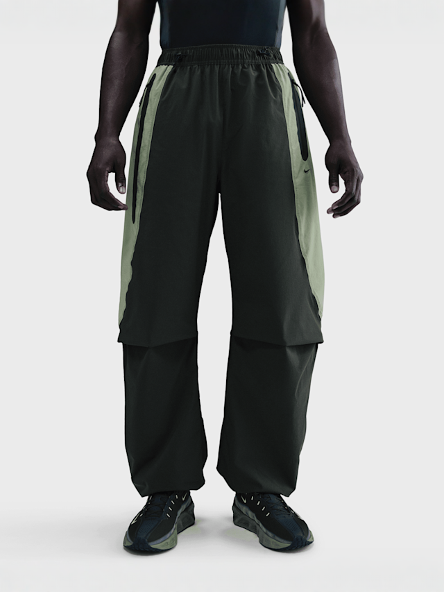Nike, Tech Dri-FIT Woven Color-Block Oversized Pants, black, Image 1 of 6