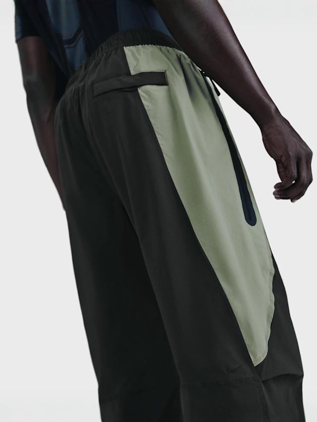 Nike, Tech Dri-FIT Woven Color-Block Oversized Pants, black, Image 5 of 6