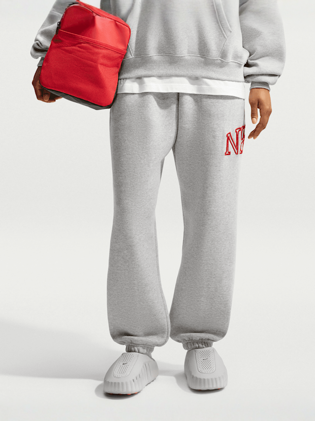 Nike  , Studio Fleece Medium Weight "Graphic Pack" Oversized Cuffed Logo Pants, grey, Image 1 of 4