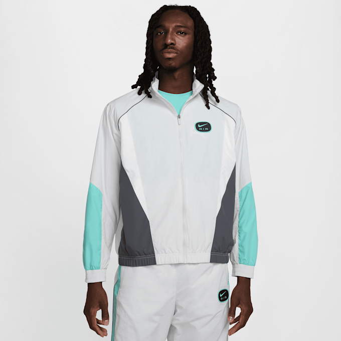 Nike Sportswear Swoosh Air Woven Track Top grau 42670 1