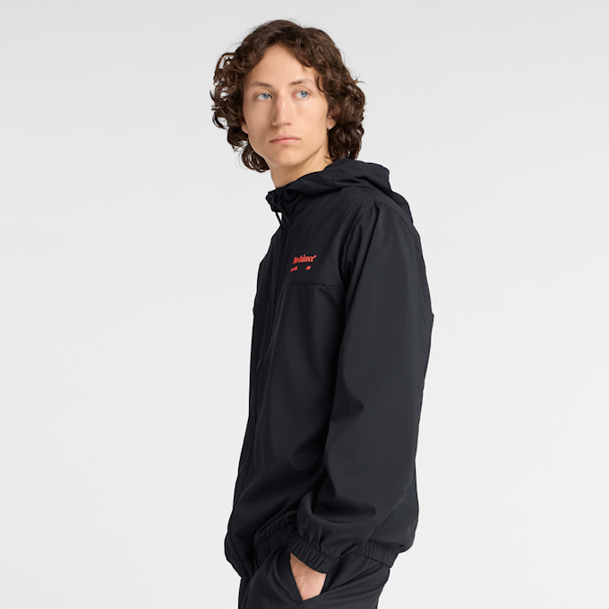 New Balance Reimagined Woven Graphic Jacket black/multi nero 47800 2