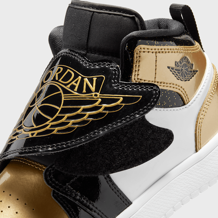 Black and gold jordans with strap best sale