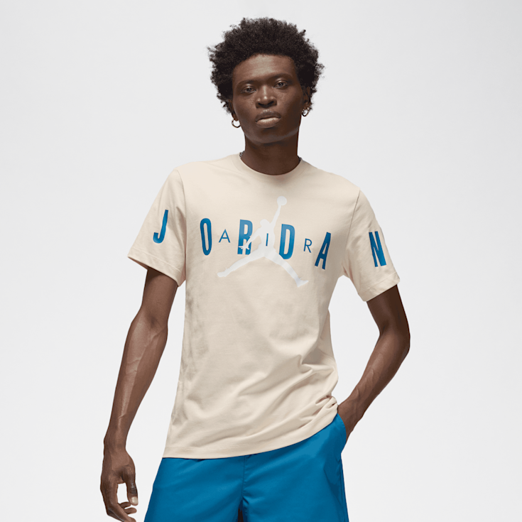 Blue and white jordan shirt discount