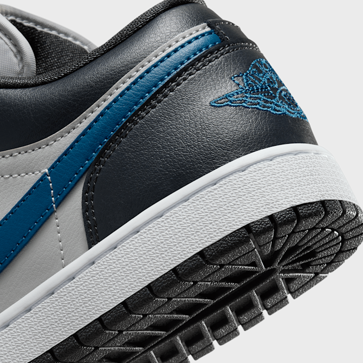 Black and blue low top jordans discount