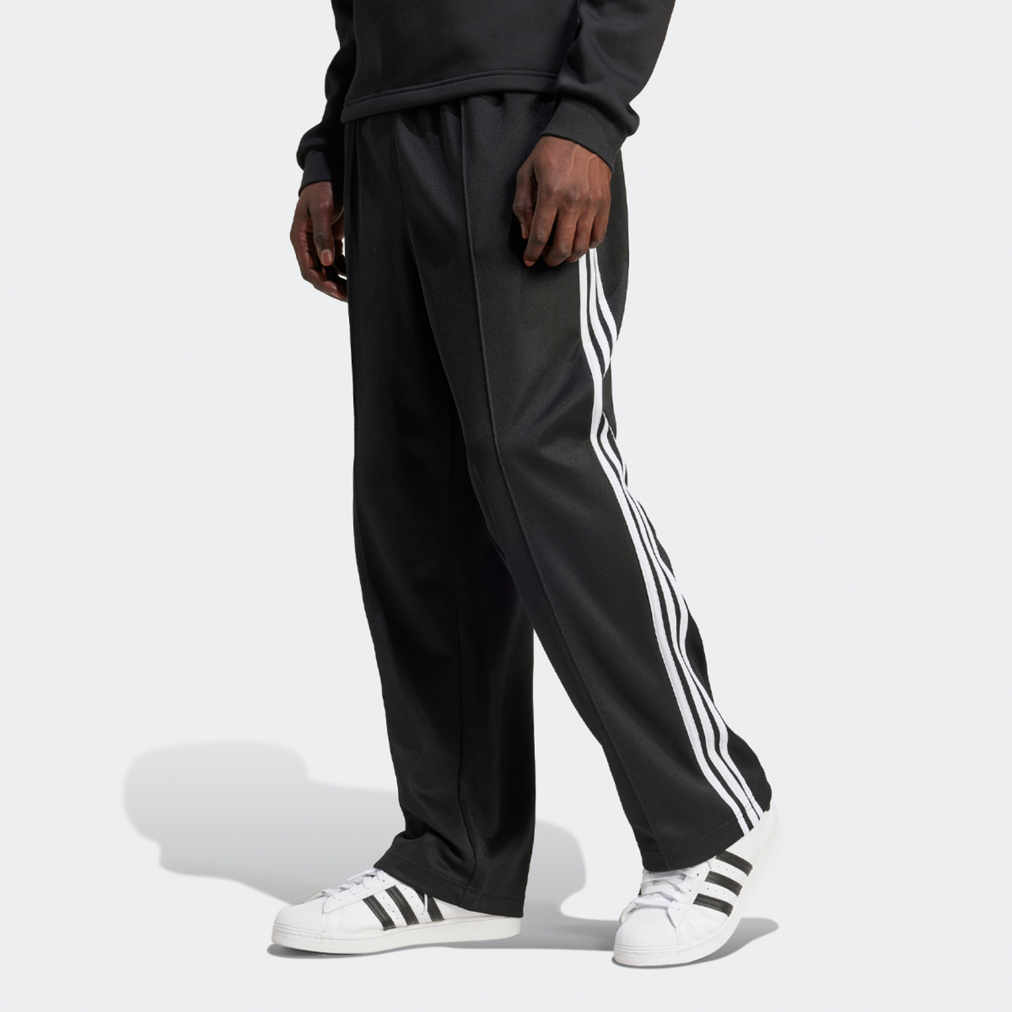 Shop adidas Originals Adicolor Baggy Fit Firebird Trackpant noir SNIPES