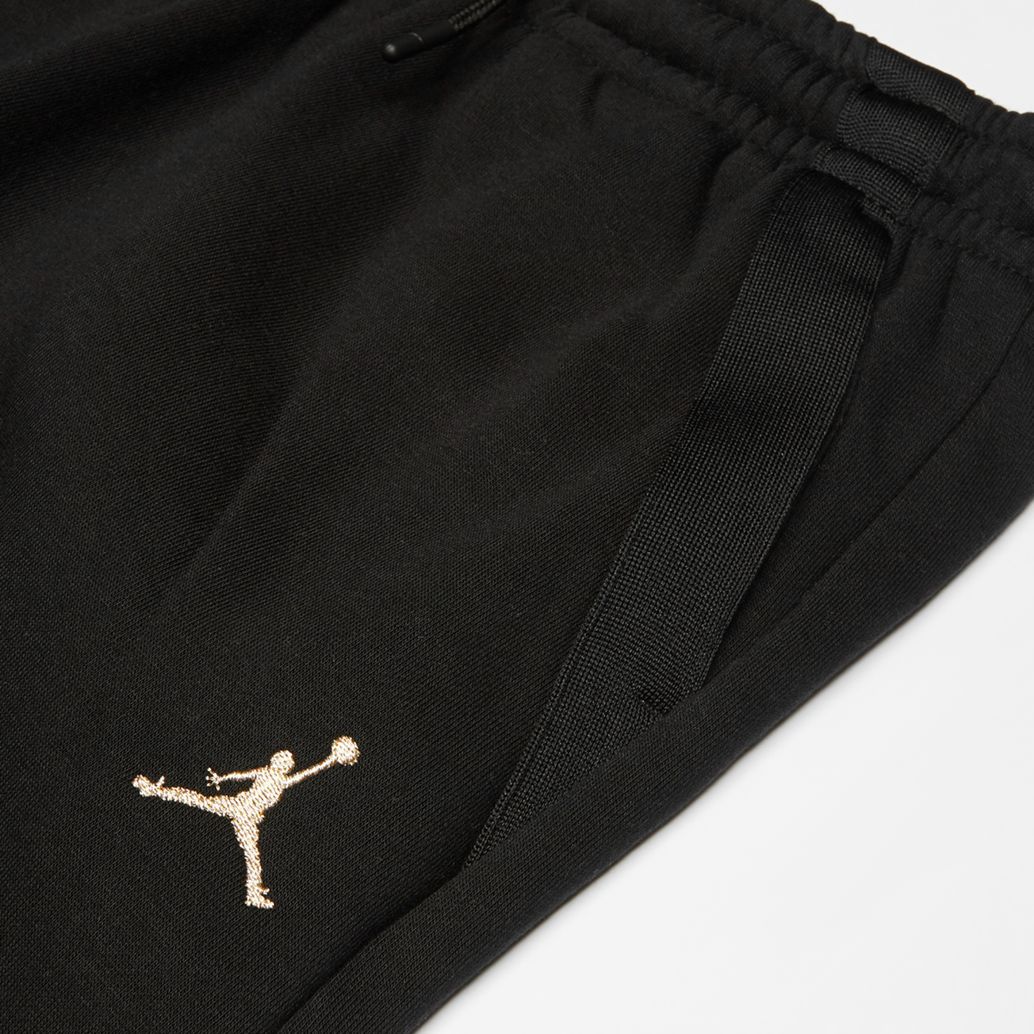 Black and gold jordan pants online