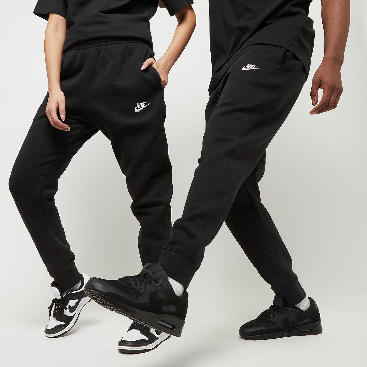 All black nike track pants on sale