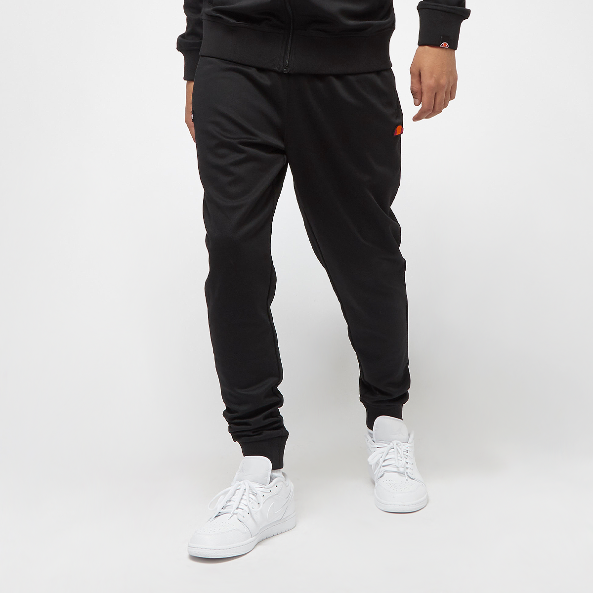 ELLESSE Tapered Pantalón 'Bertoni' En Negro | ABOUT YOU