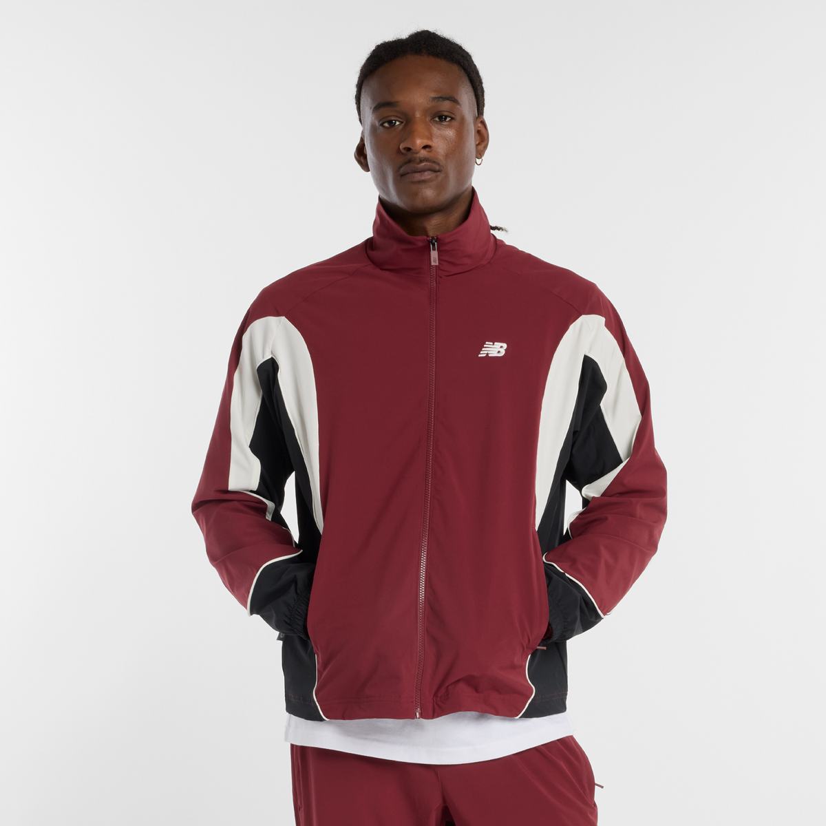 New Balance In Game Woven Track Jacket rot | MJ53611-MHB | SNIPES
