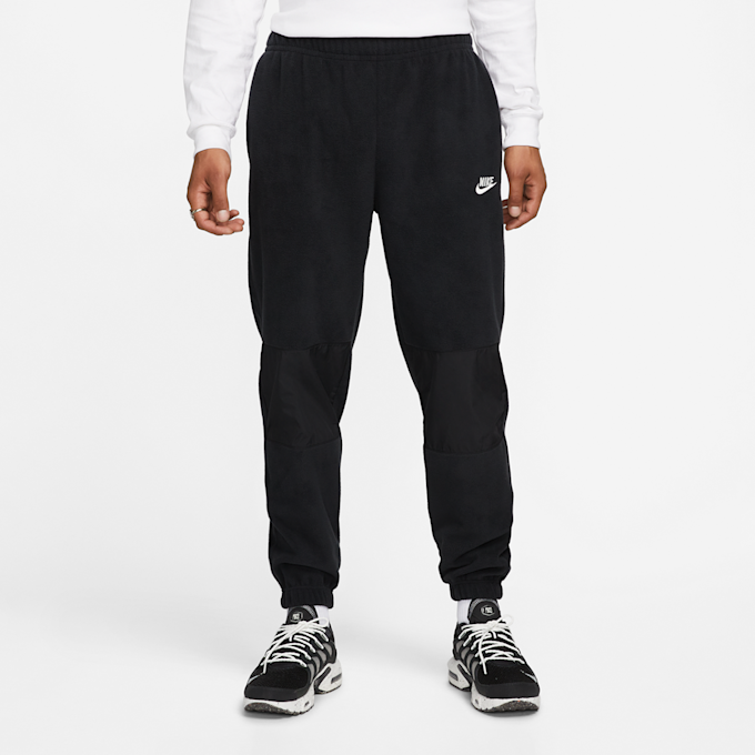 Nike   Club Fleece+ Fleece Winterized Pants czerwony 14880 1