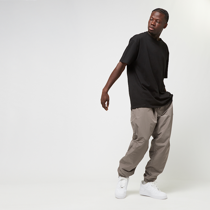 Nike Nocta NRG Woven Track Pants brązowy 40399 7