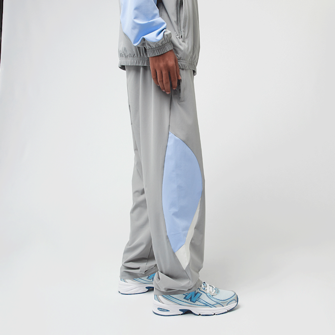 New Balance Woven Track Pant beige grijs 42299 3