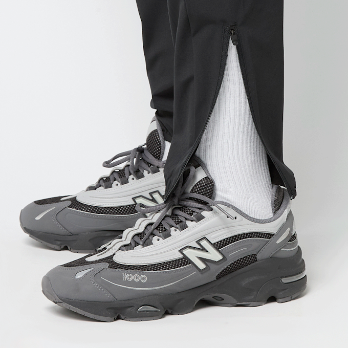 New Balance Woven Tapered Track Pant nero 45465 4