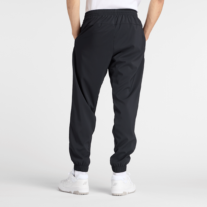 New Balance Reimagined Woven Jogger preto 47804 2