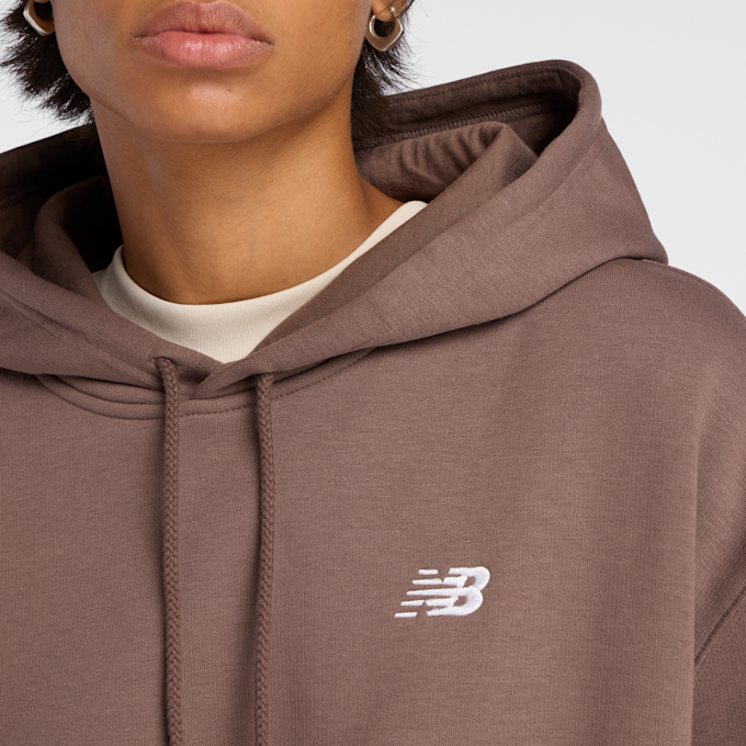 New Balance SPORT ESSENTIALS FLEECE HOODIE blue agate (423) brązowy 93537 4