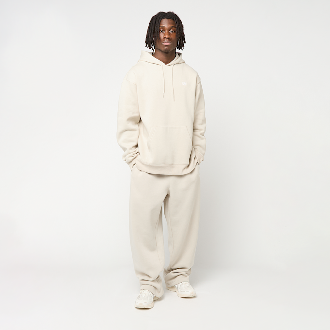 New Balance Sport Essentials Fleece Pants beż 93644 5