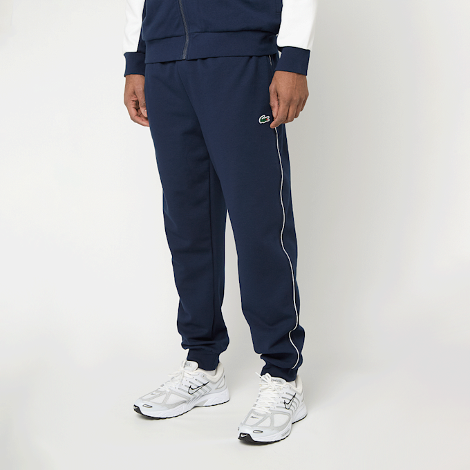 Lacoste Trainingsanzüge Hos./Zus. bleu 95277 1