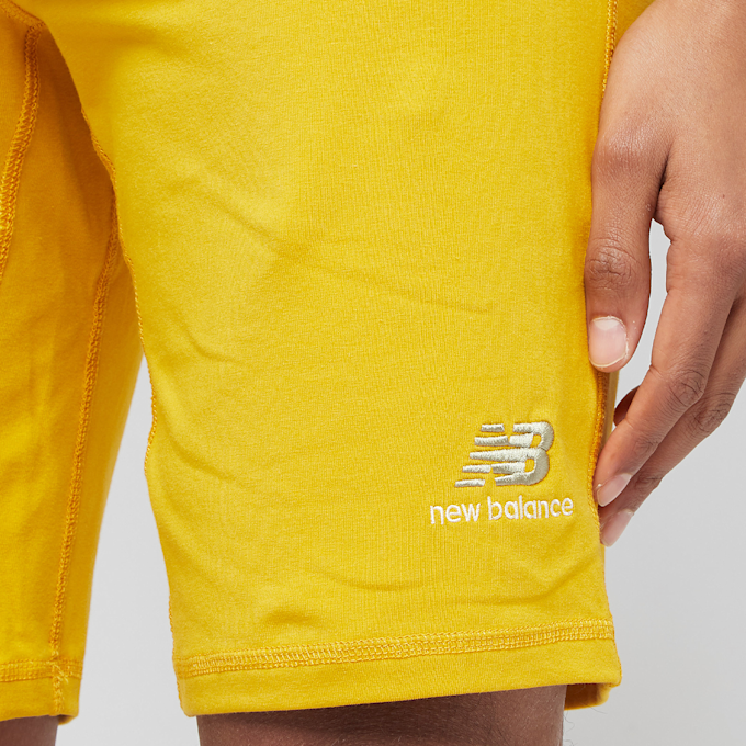 New Balance Unissentials Legging Short varsity gold UndefinedColor 7049 3