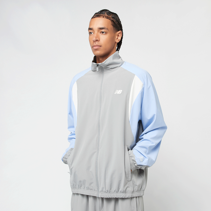 New Balance Woven Track Jacket grau 42327 1