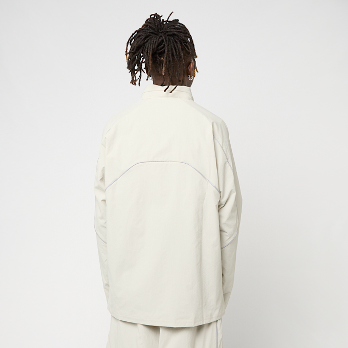 New Balance Reflective Woven Jacket bež 96100 2
