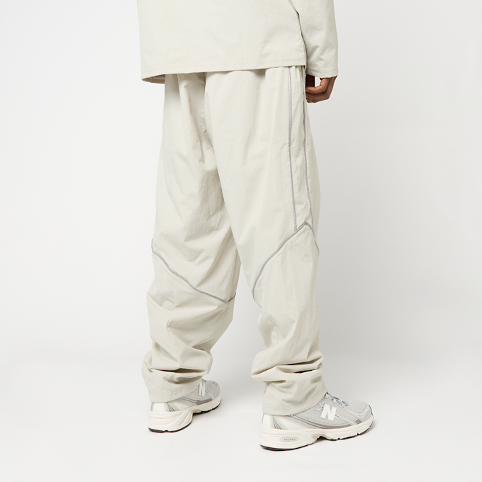 New Balance Reflective Woven Pants beige 96108 2