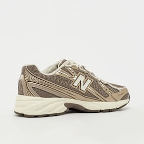 New Balance 740 gold