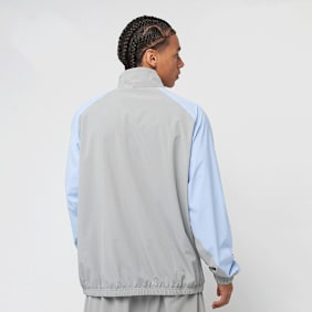 New Balance Woven Track Jacket grau