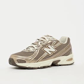 New Balance 740 dourado