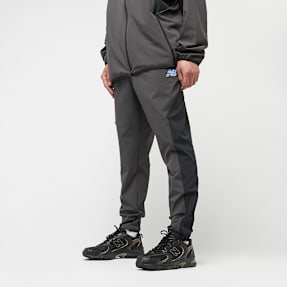 New Balance Woven Tapered Track Pant gris
