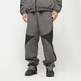Capacité Logo Rubber Badge Colorblocked Trackpants grey/black grijs
