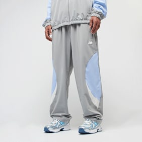 New Balance Woven Track Pant beige cinzento