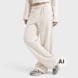 New Balance Brushed Coastal Fleece Pant bege 102952 1
