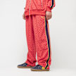 PUMA T7 Road To Unity All Over Print Relaxed Straight Tracküants DK rood 44951 1