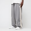 adidas Originals Firebird Adicolor Baggy Fit Trackpants gris 48875 1