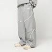 New Balance Woven Trackside Pant siva 100635 1
