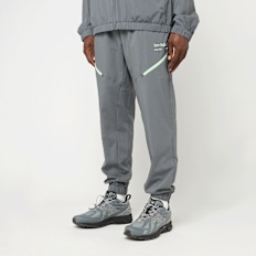 New Balance Reimagined Woven Jogger grigio