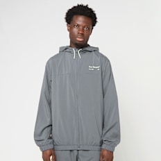 New Balance Reimagined Woven Graphic Jacket grijs