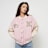 Karl Kani Retro Patch Star Logo Oversized College Jacket lichtroze