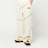 New Balance Woven Trackside Pant beige