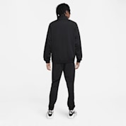 Shop Nike Club Poly Knit Tracksuit nero